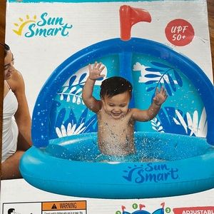 Inflatable pool with sun shade sailboat splash pool